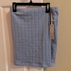 Cute powder blue skirt with embroidered design pattern